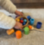 Child playing with LETme Toys Bowl & Spoon with Balls & cups