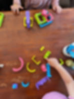 Children playing with LETme Toys Rainbow Kit